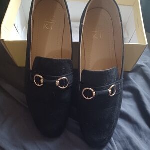 Elegant Black Loafers with Gold Accents